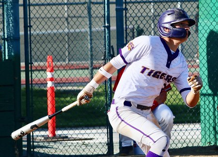 Tigers thrill local fans with run in bottom of the seventh to defeat Hanford 4-3. Open playoffs Wednesday against Mission Prep Lemoore's Andrew Mora lines a single to advance Dominick Najar to third base to set up the winning run in the seventh inning.
